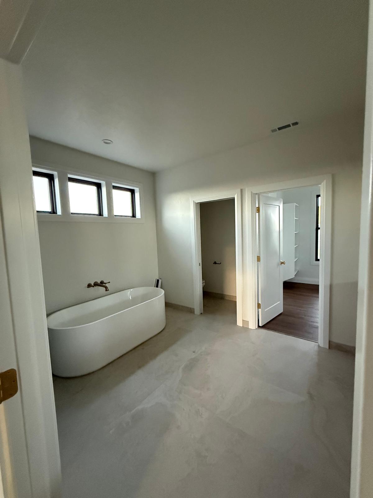 Master bathroom with tub